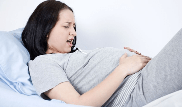 abdominal pain caused by worms during pregnancy